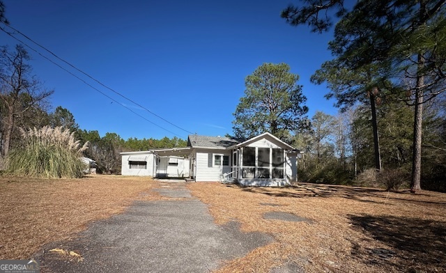 a house with trees in front of it