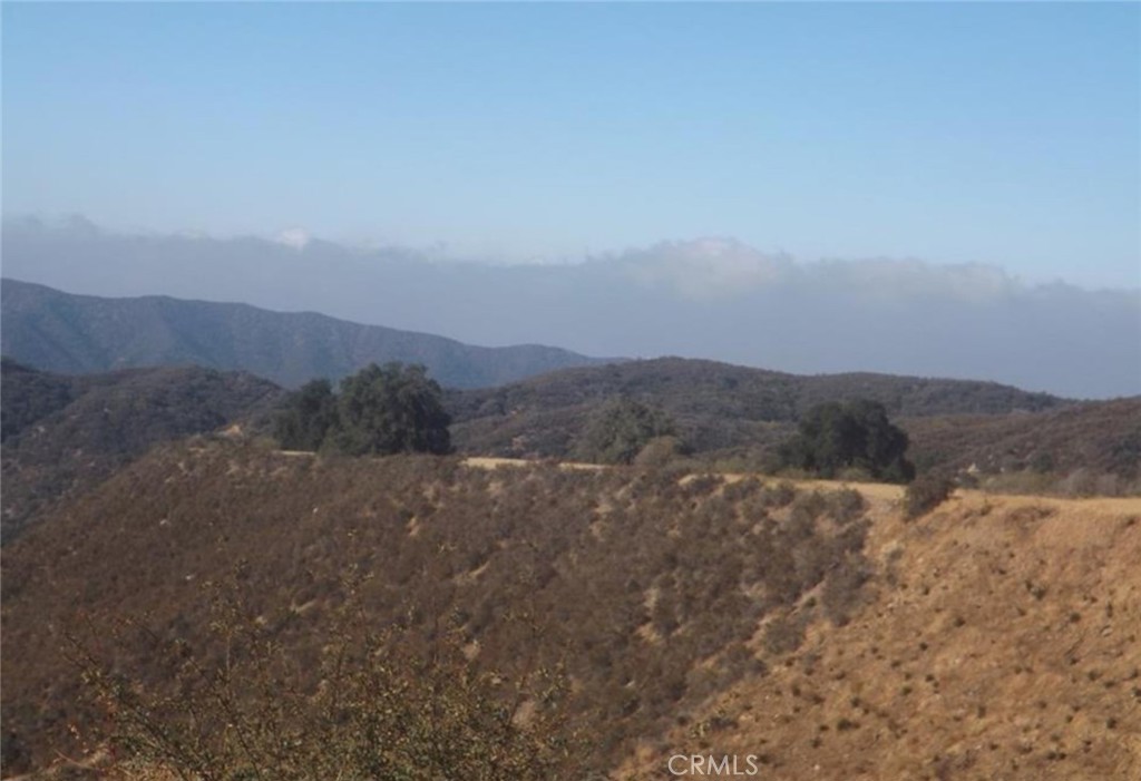 a view of an outdoor space with mountain view