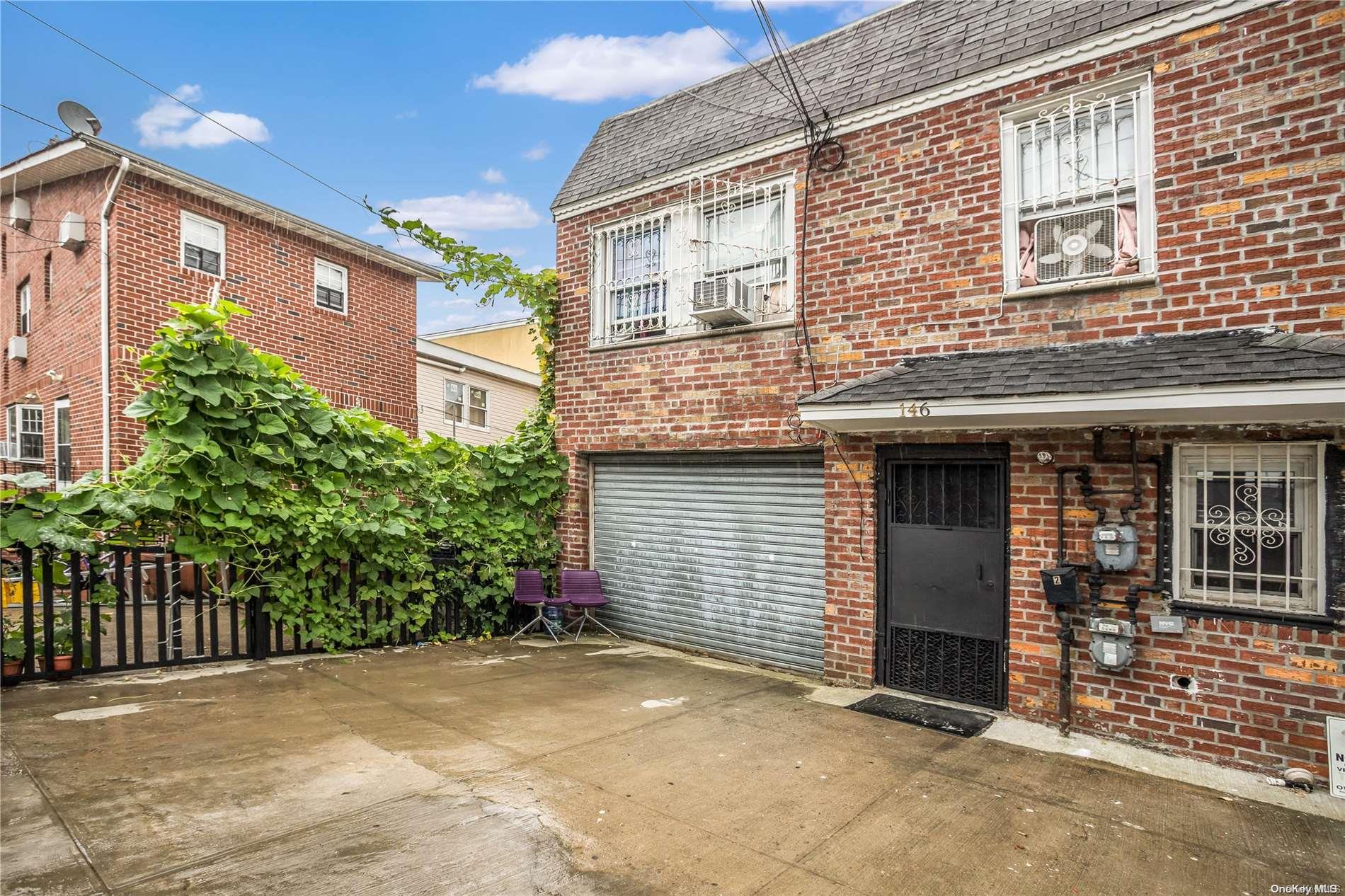 a view of a house with a garage