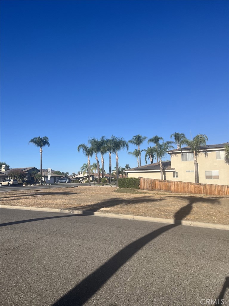 a view of a building and a yard