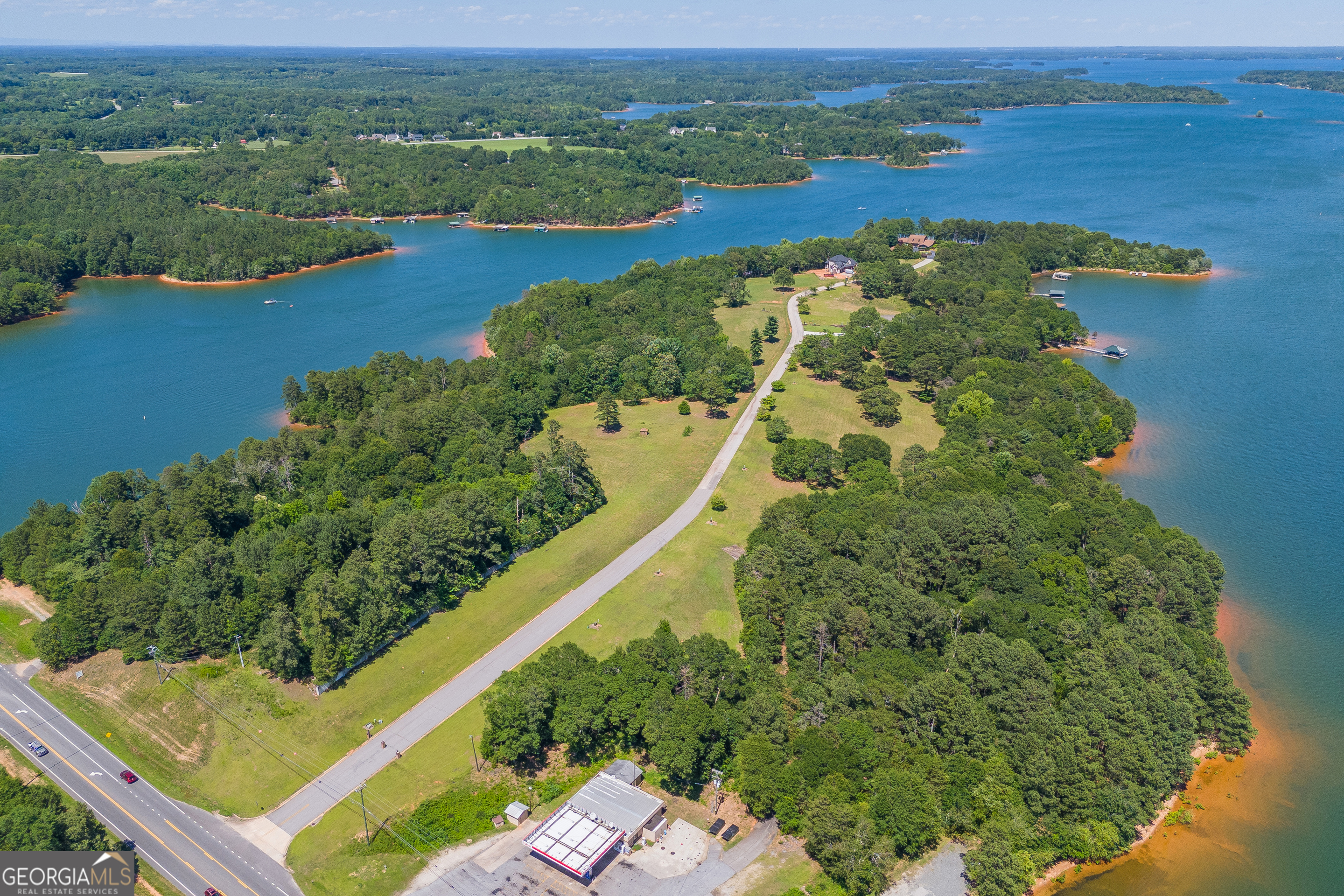 an aerial view of lake residential house with outdoor space