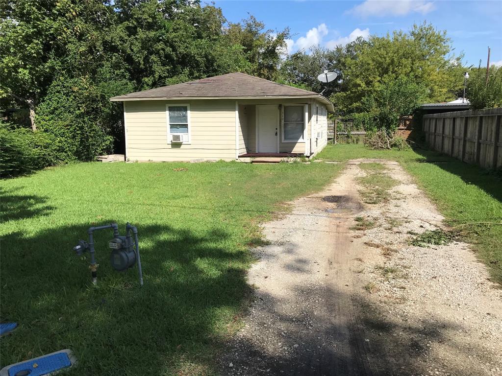 a front view of a house with yard