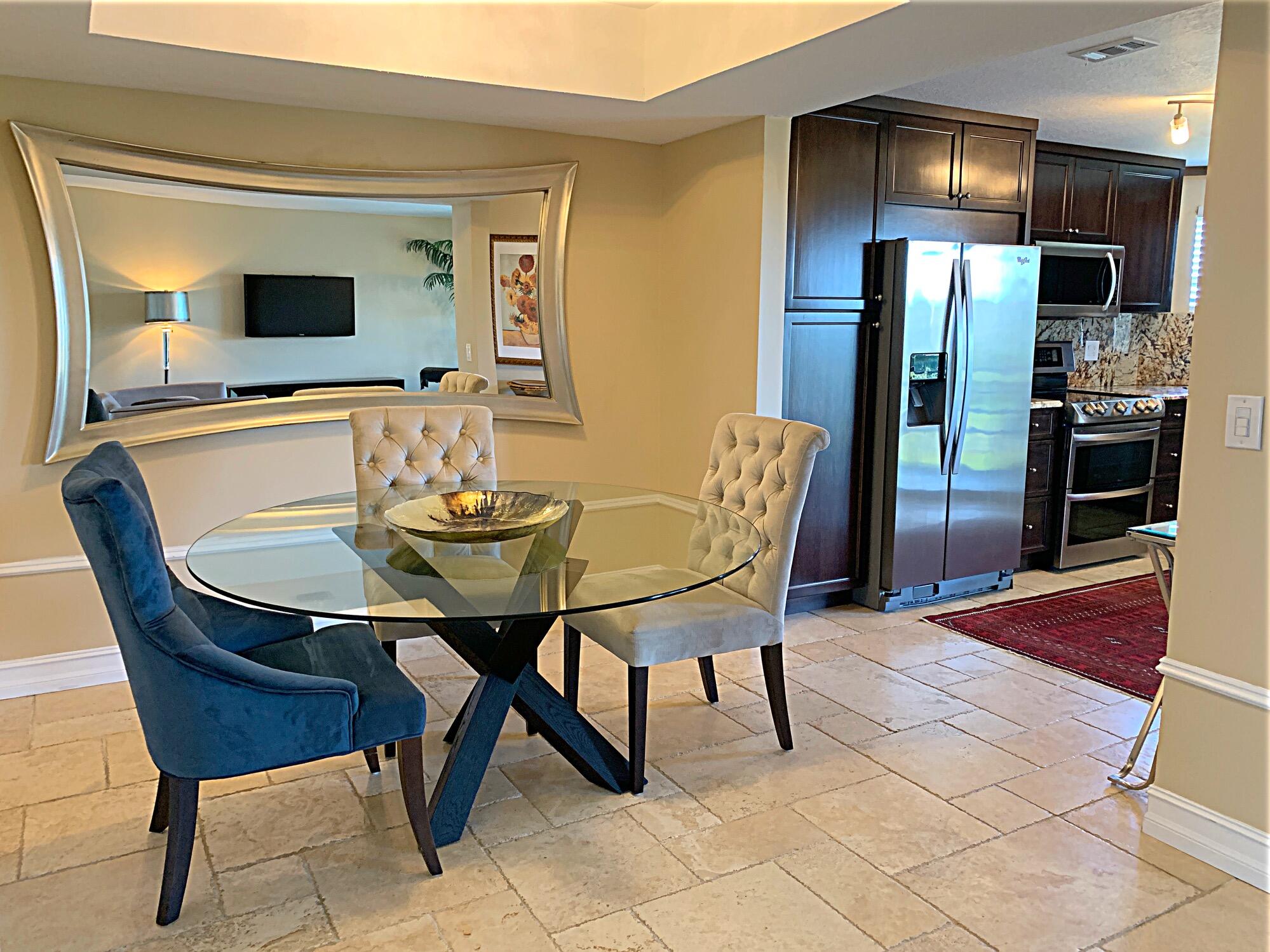 a view of a dining room with furniture