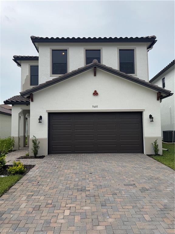 a view of a house with garage