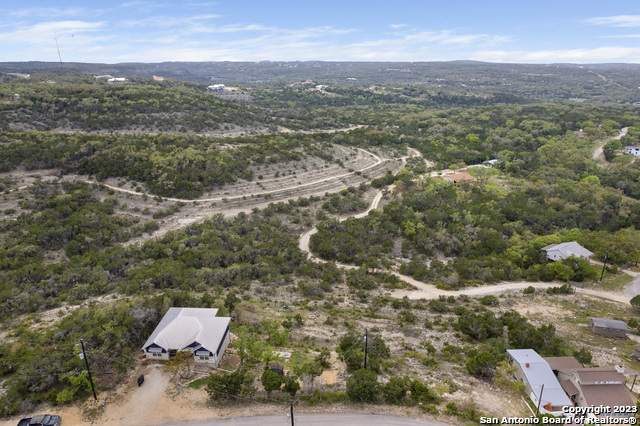 an aerial view of residential house with parking space