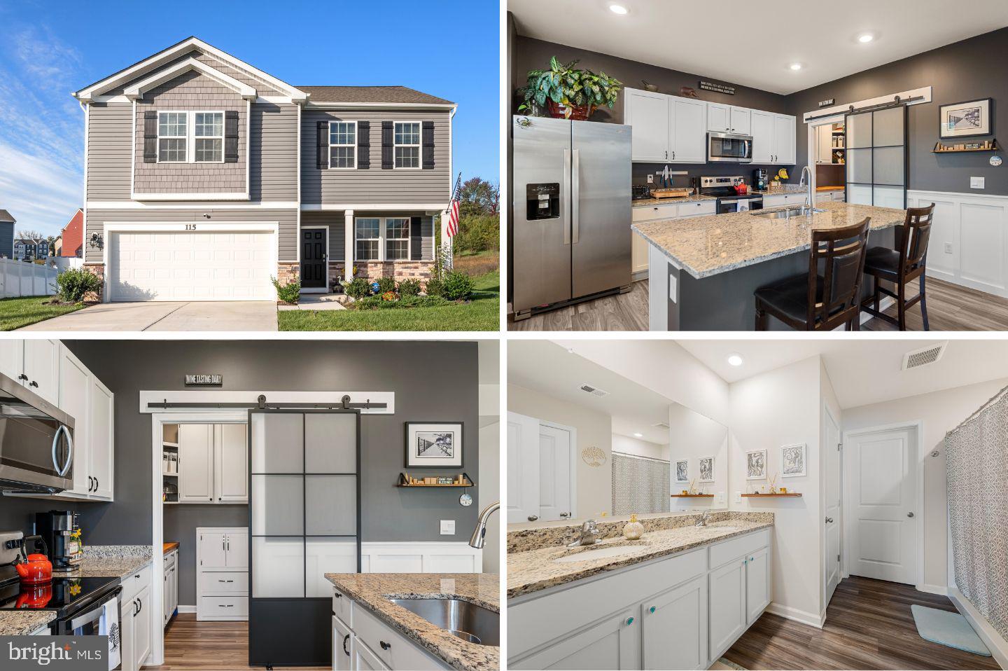 a view of kitchen with stainless steel appliances kitchen island granite countertop a sink and cabinets