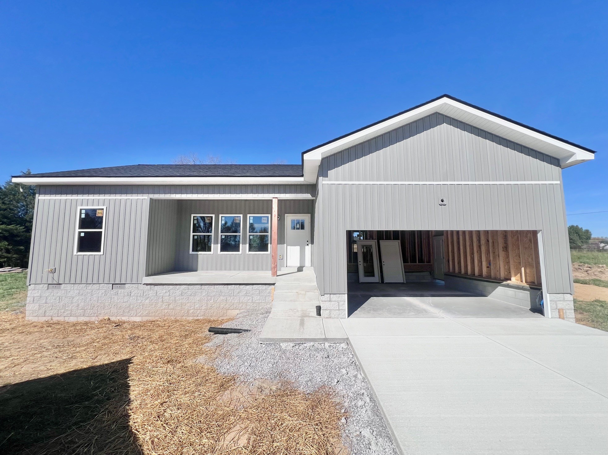 front view of a house with a yard