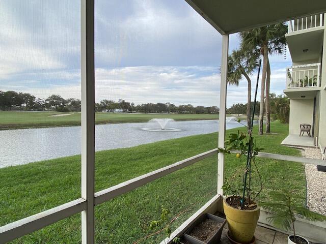 a view of a garden from a balcony