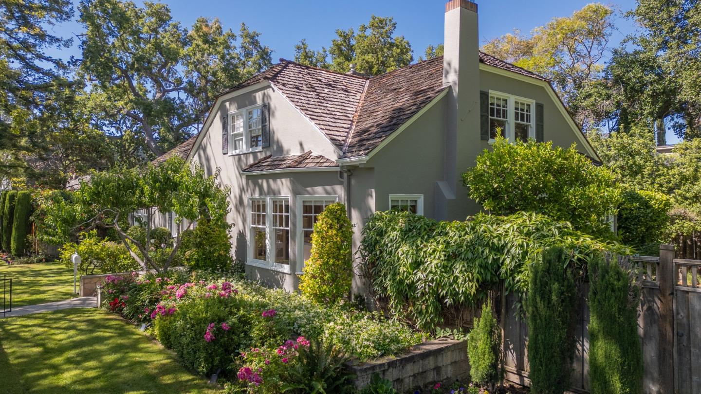 front view of a house with a garden