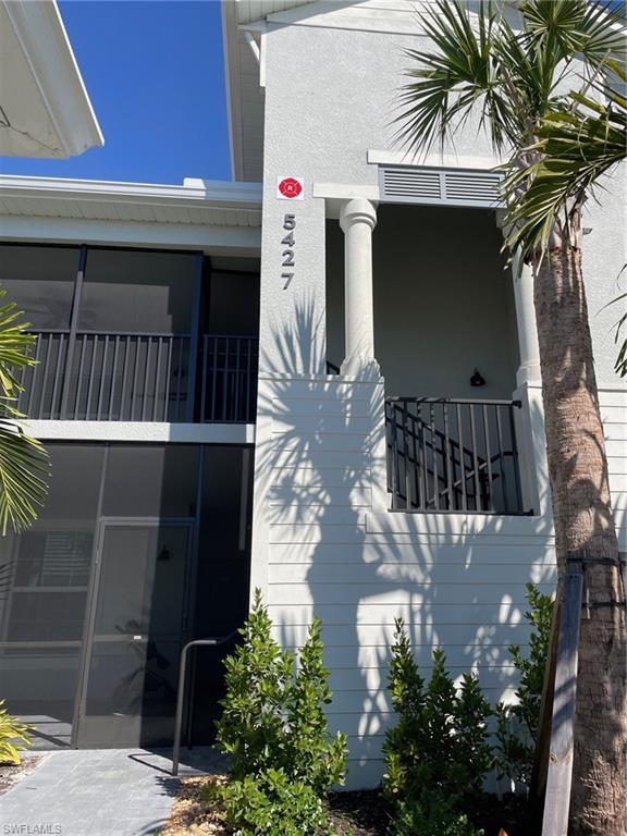 a picture of a house with a balcony