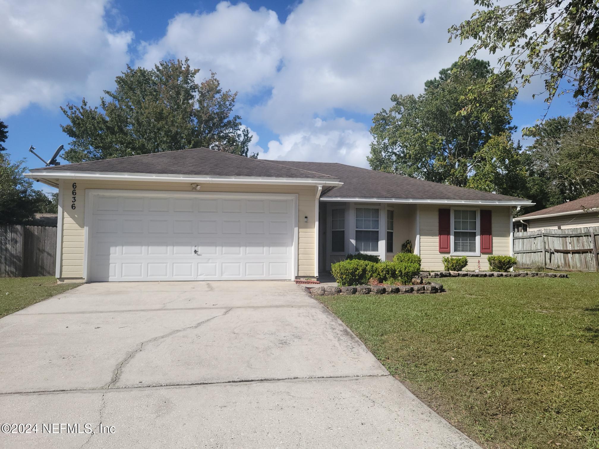 front view of house with a yard