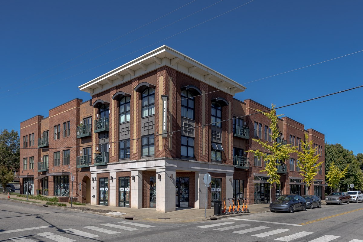 a view of a building with a street