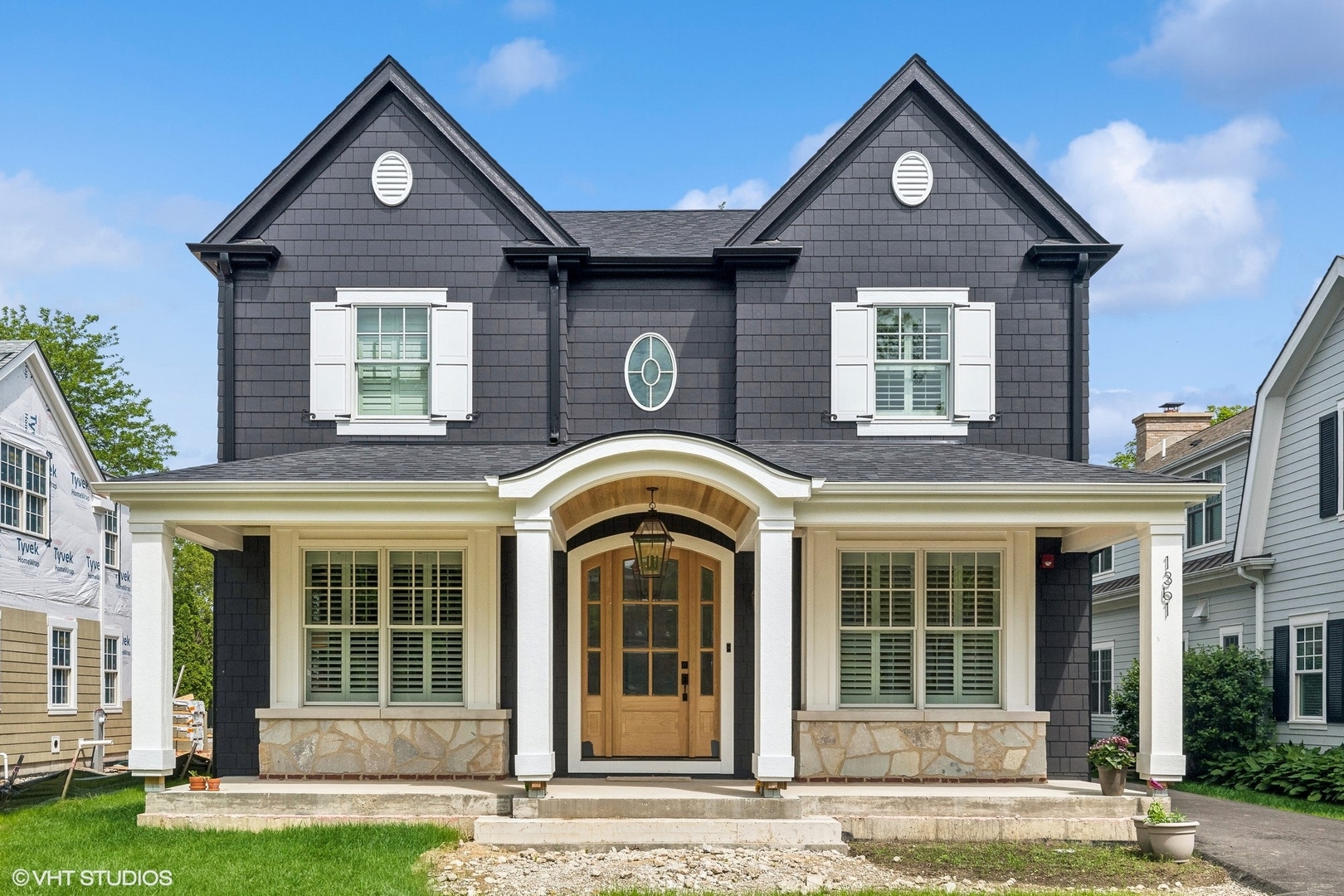 front view of a house with a yard