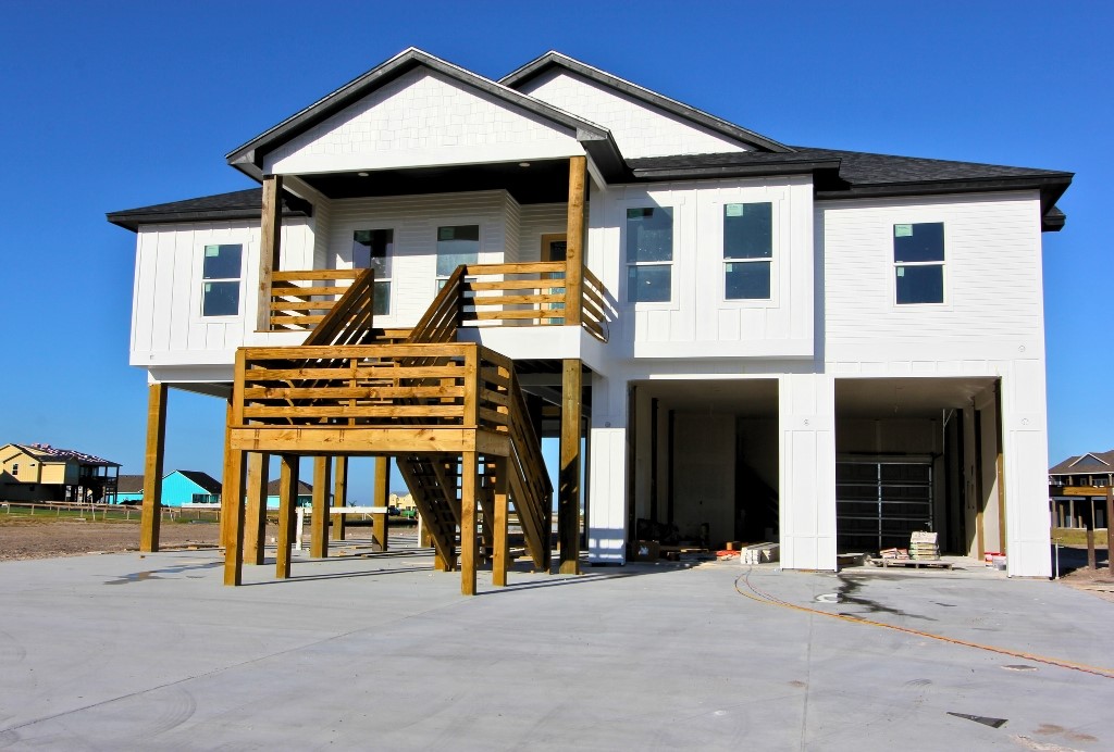 a front view of a house with glass windows