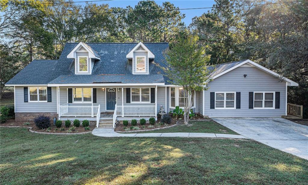 front view of a house with a yard