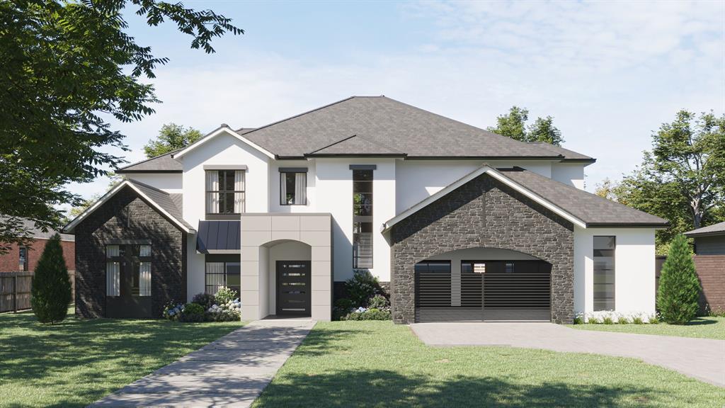 a front view of a house with yard and trees