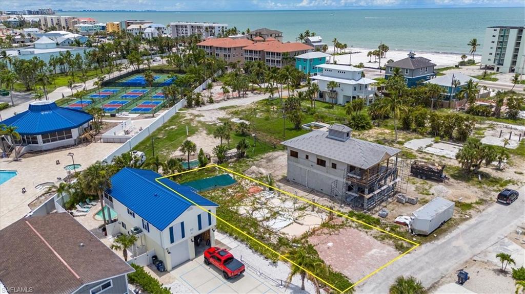 an aerial view of a houses with outdoor space