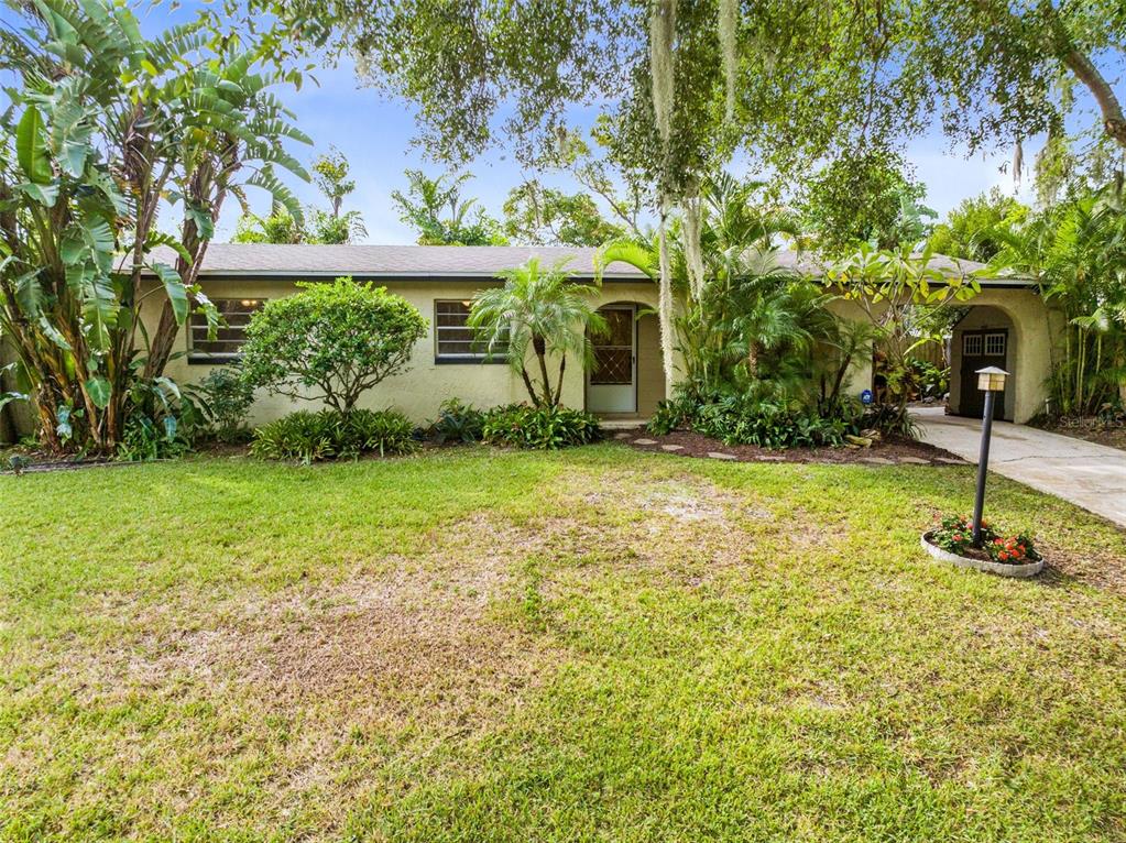 a view of a backyard with a garden