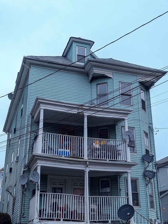 a view of a house with a deck