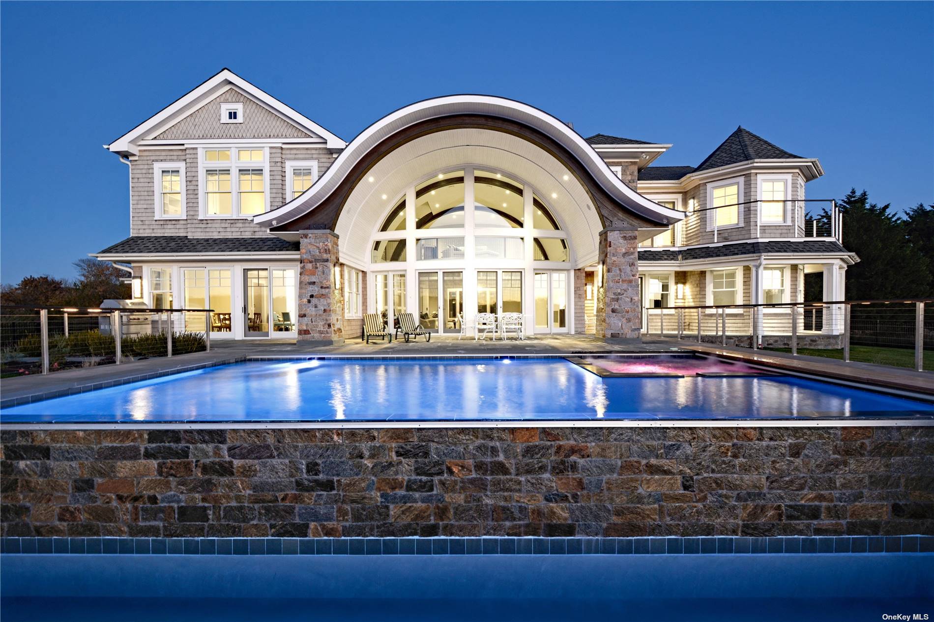 a front view of a house with swimming pool