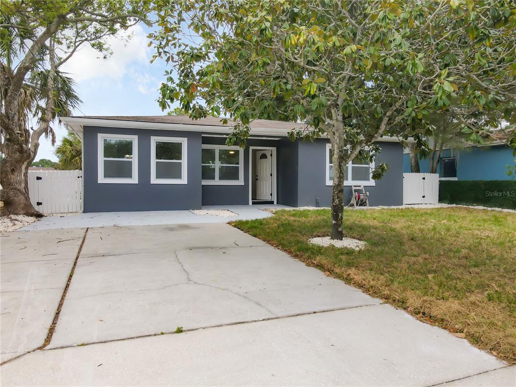 front view of a house with a yard