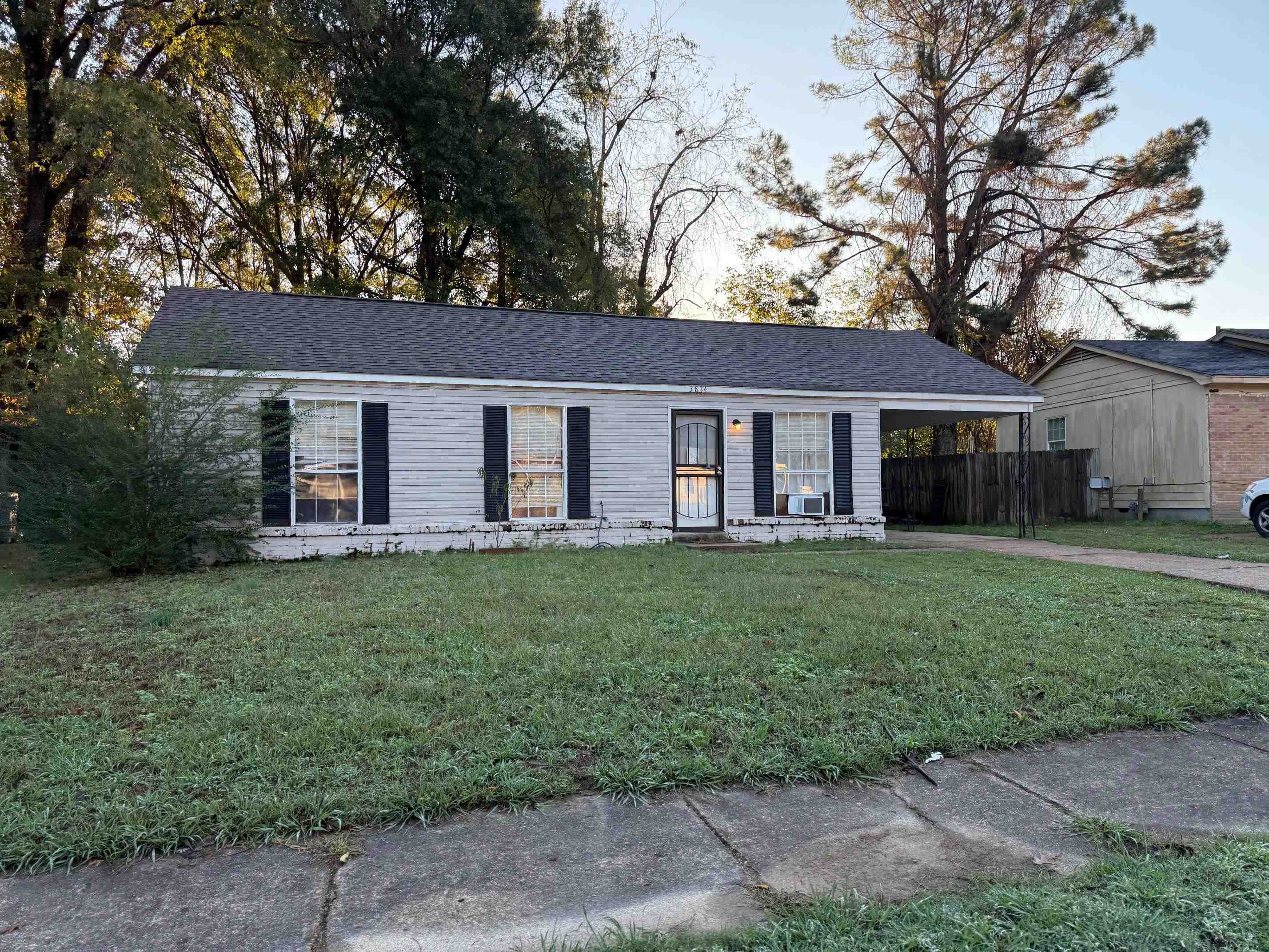 front view of a house with a yard