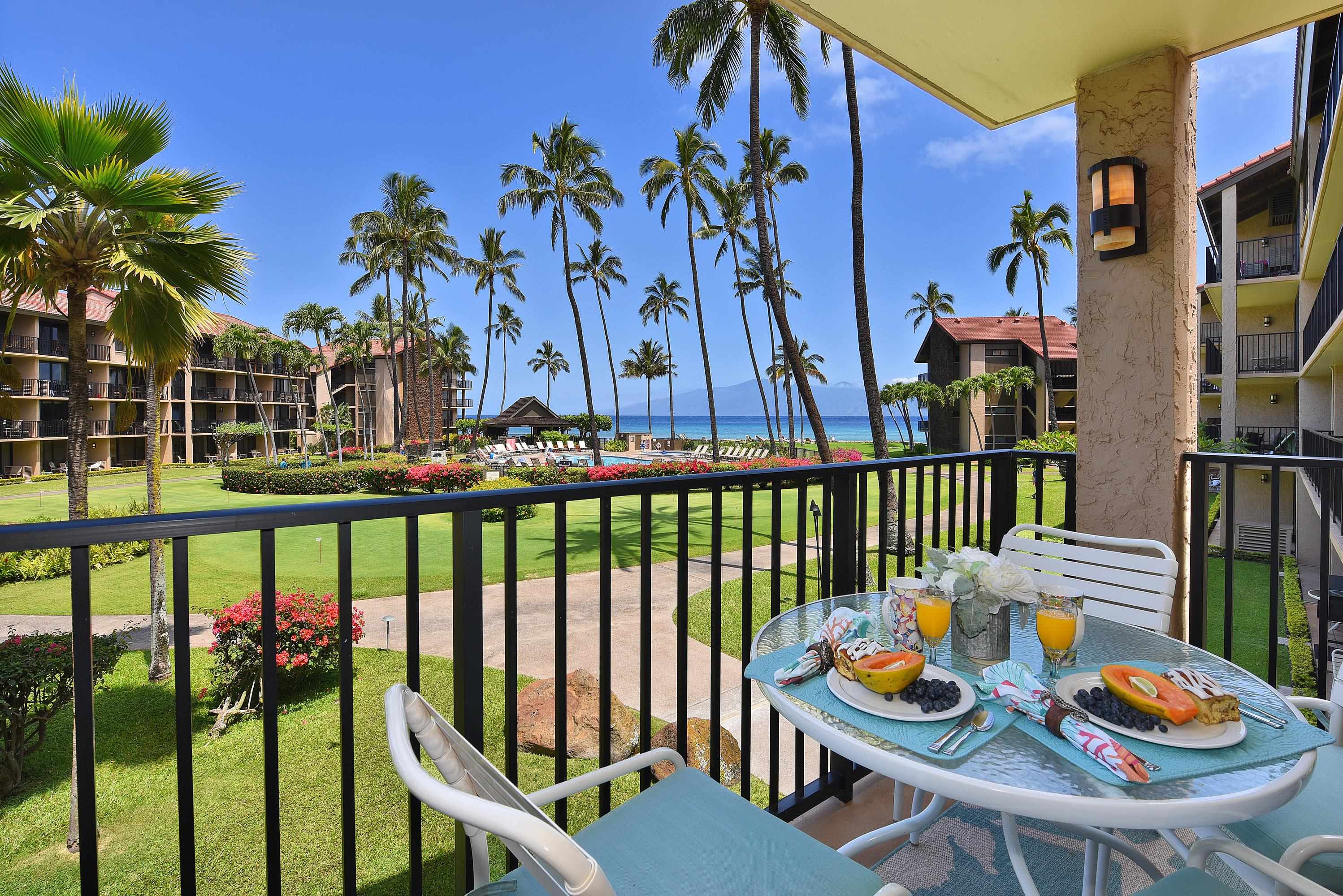 a view of a chairs and table in patio