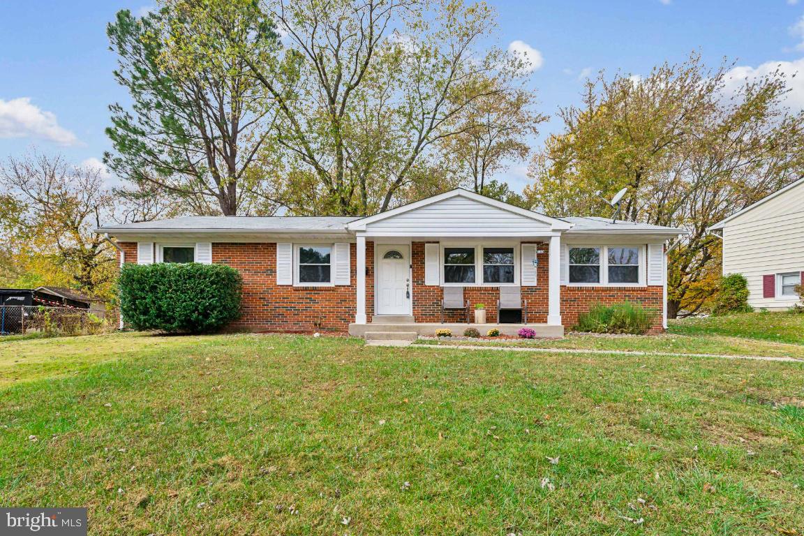 front view of a house with a yard