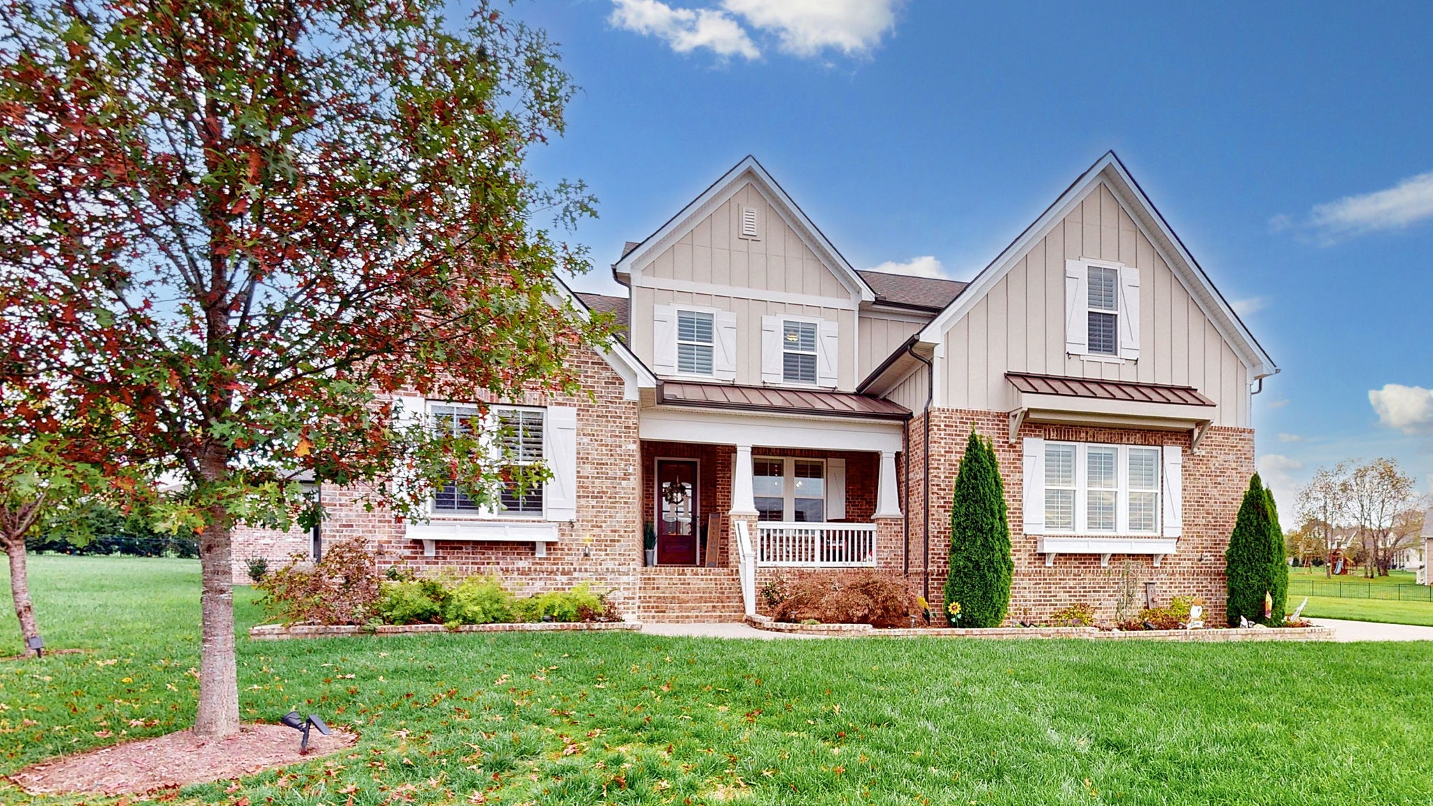 front view of house with a yard