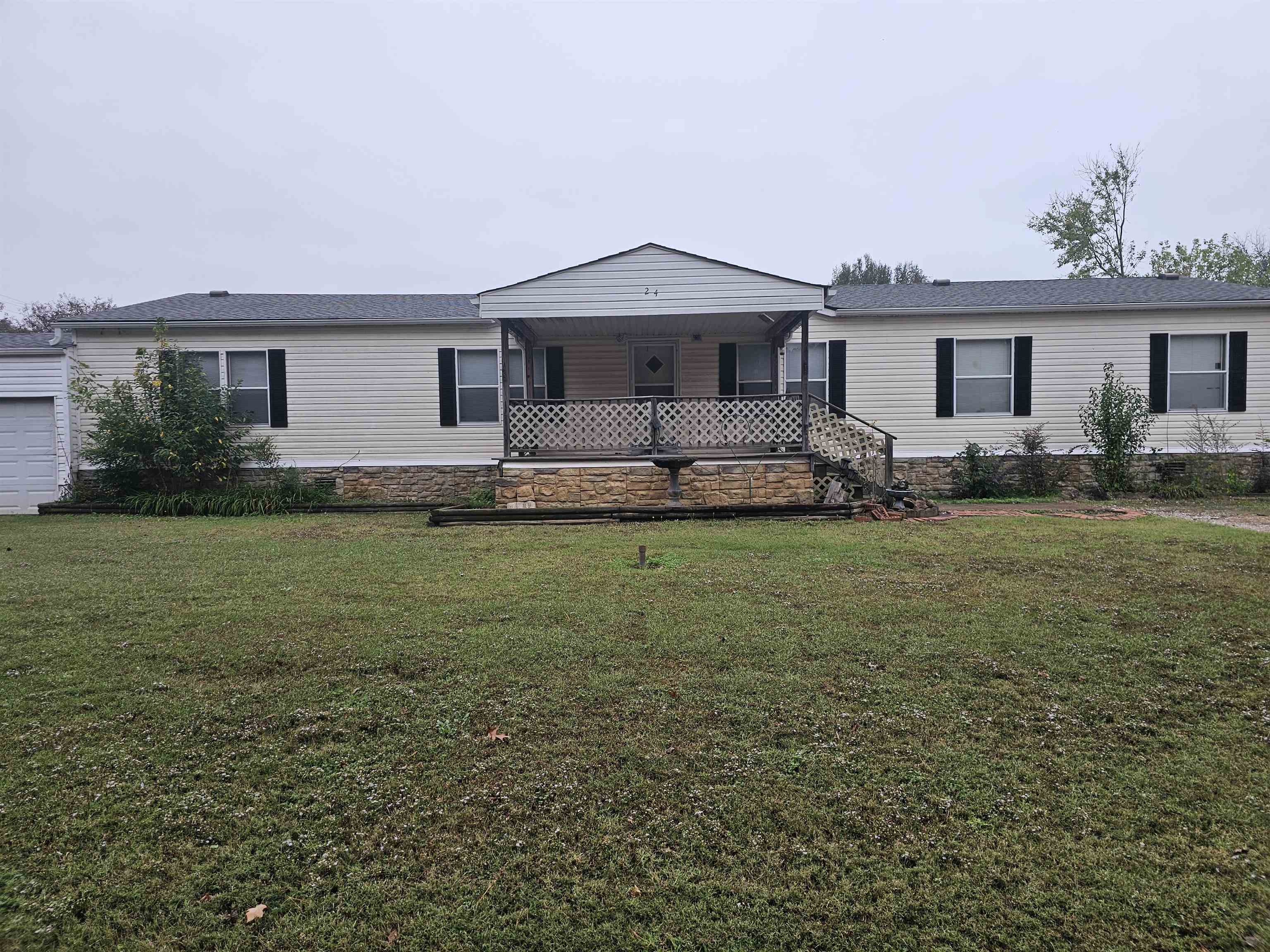 View of front of home with a front yard