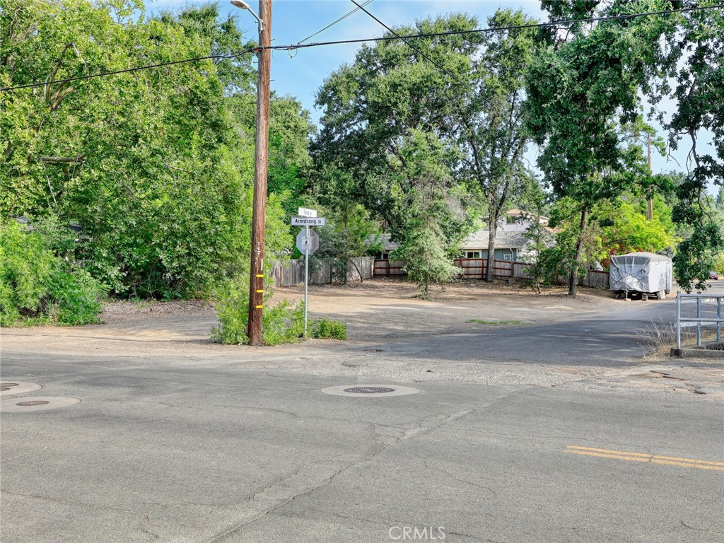 a road with a building in the background