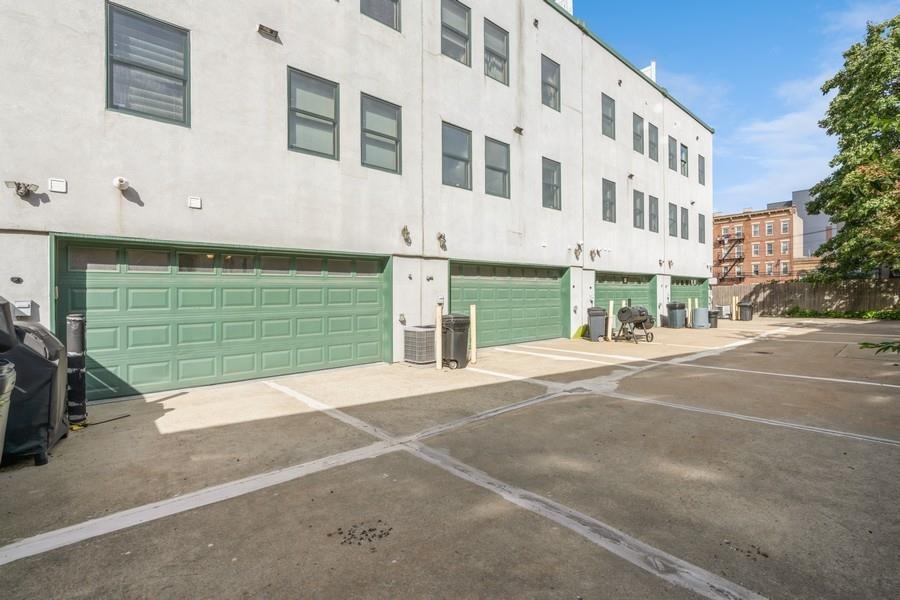 Jersey City Homes For Sale- 319 1st St #108 Finally, a large townhome style  condo with outdoor space and garage parking comes to market in the  Hudson NJ 07047 230016440