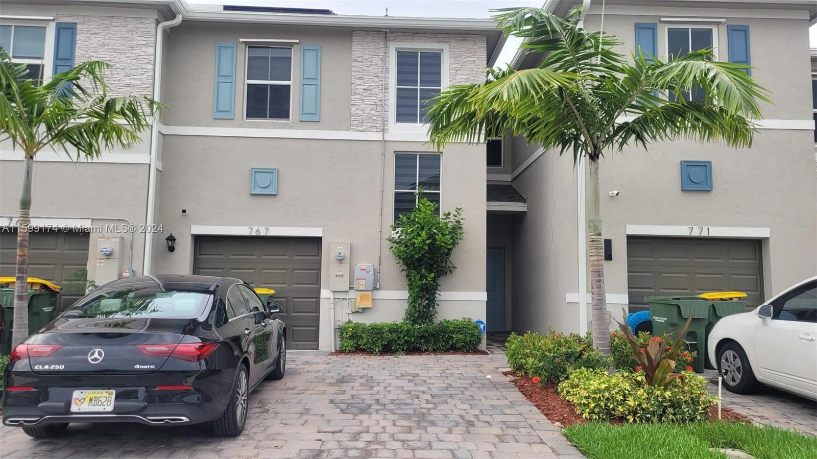 a car parked in front of a house