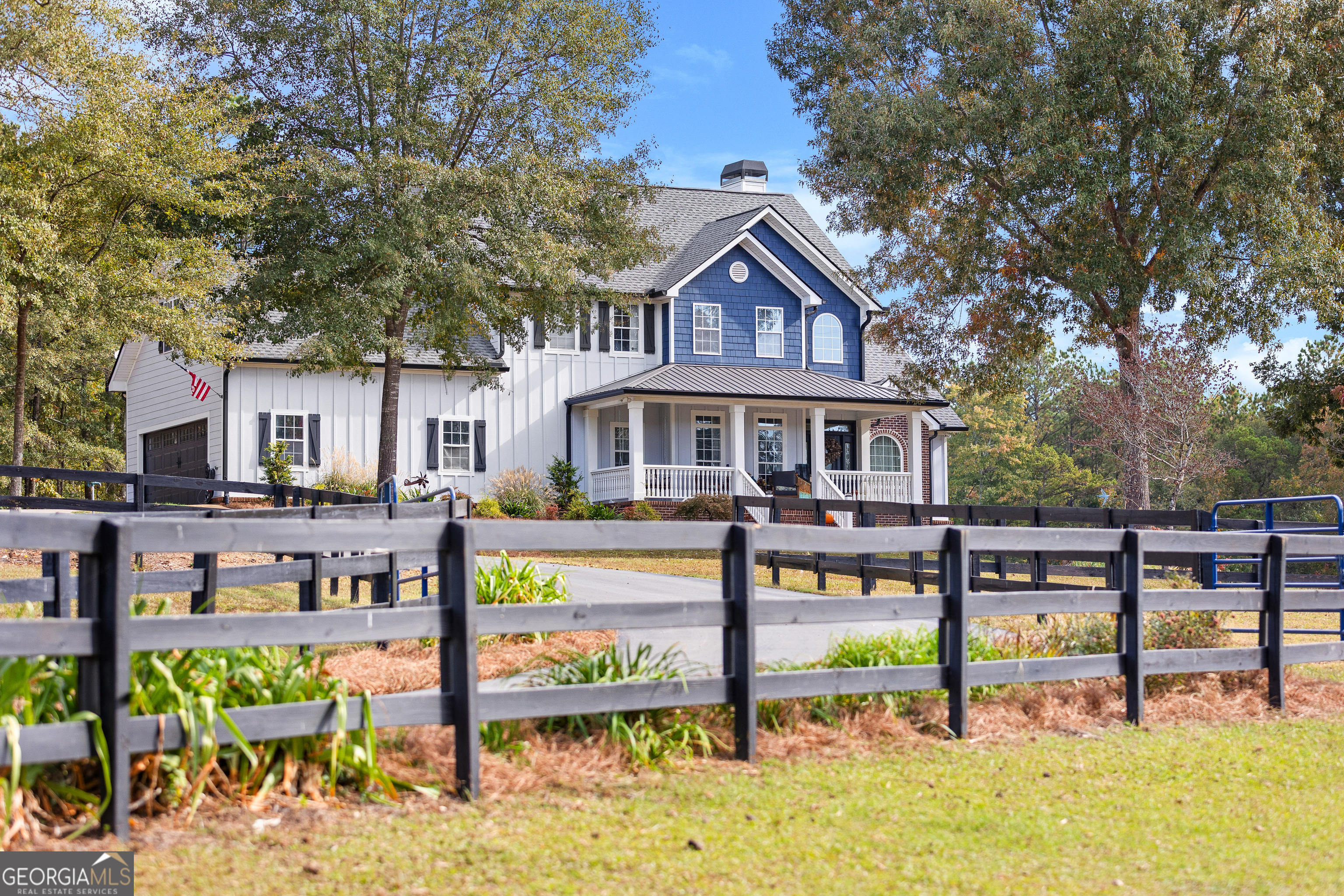 a front view of a house with swimming pool