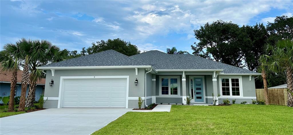 front view of a house with a yard