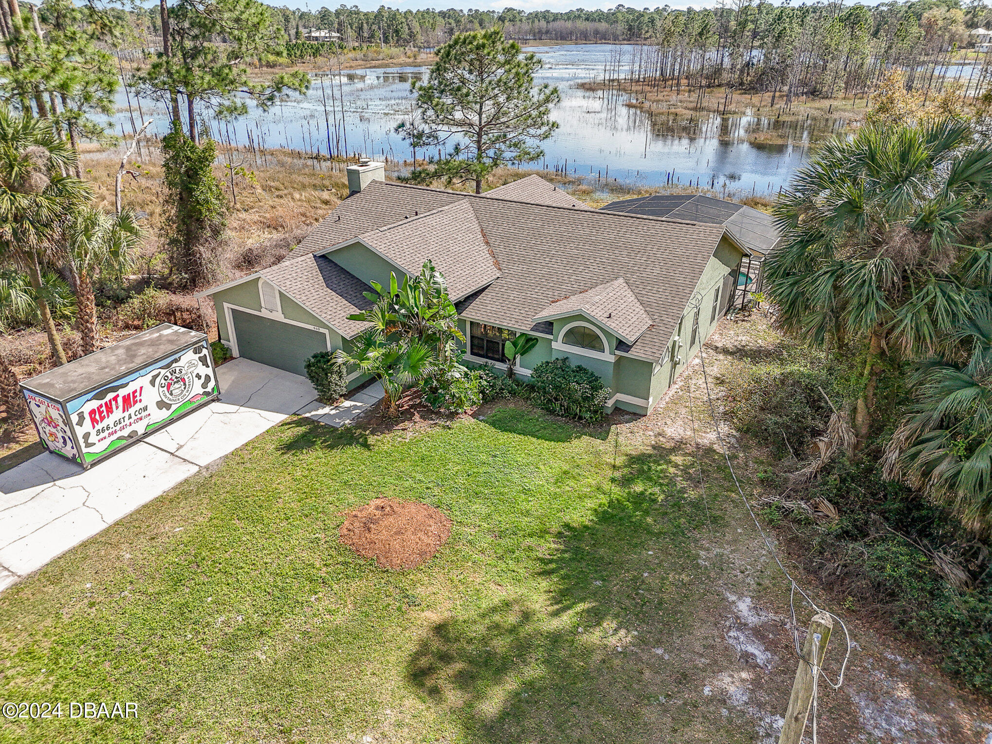 an aerial view of residential house with outdoor space