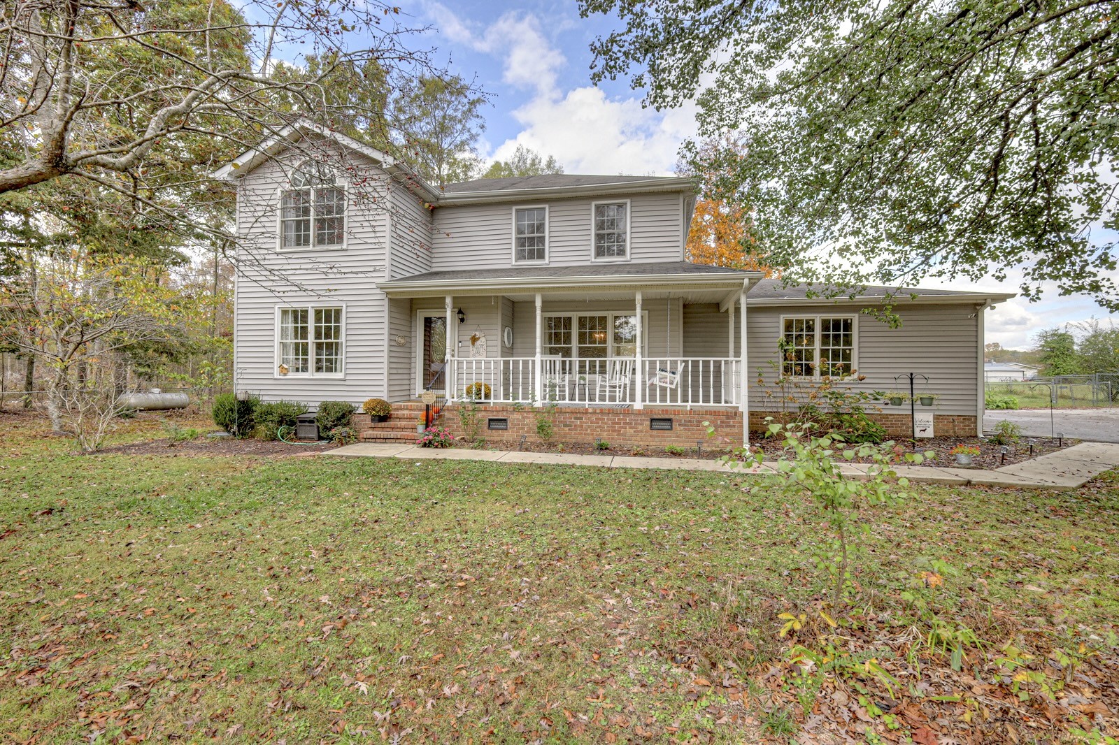 front view of a house with a yard