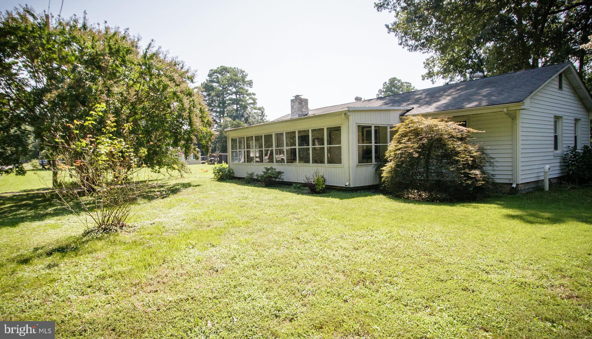 a view of a house with a garden