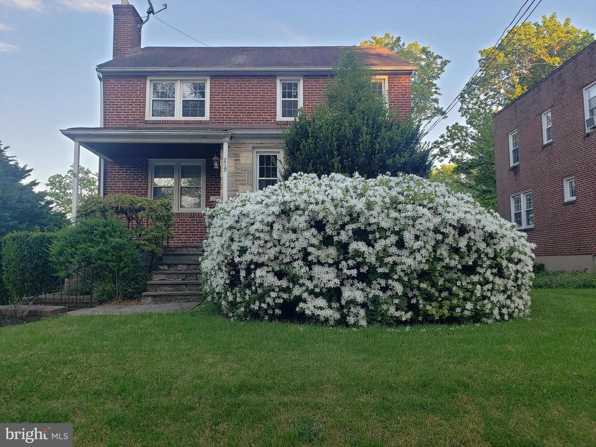 a view of a house with a garden