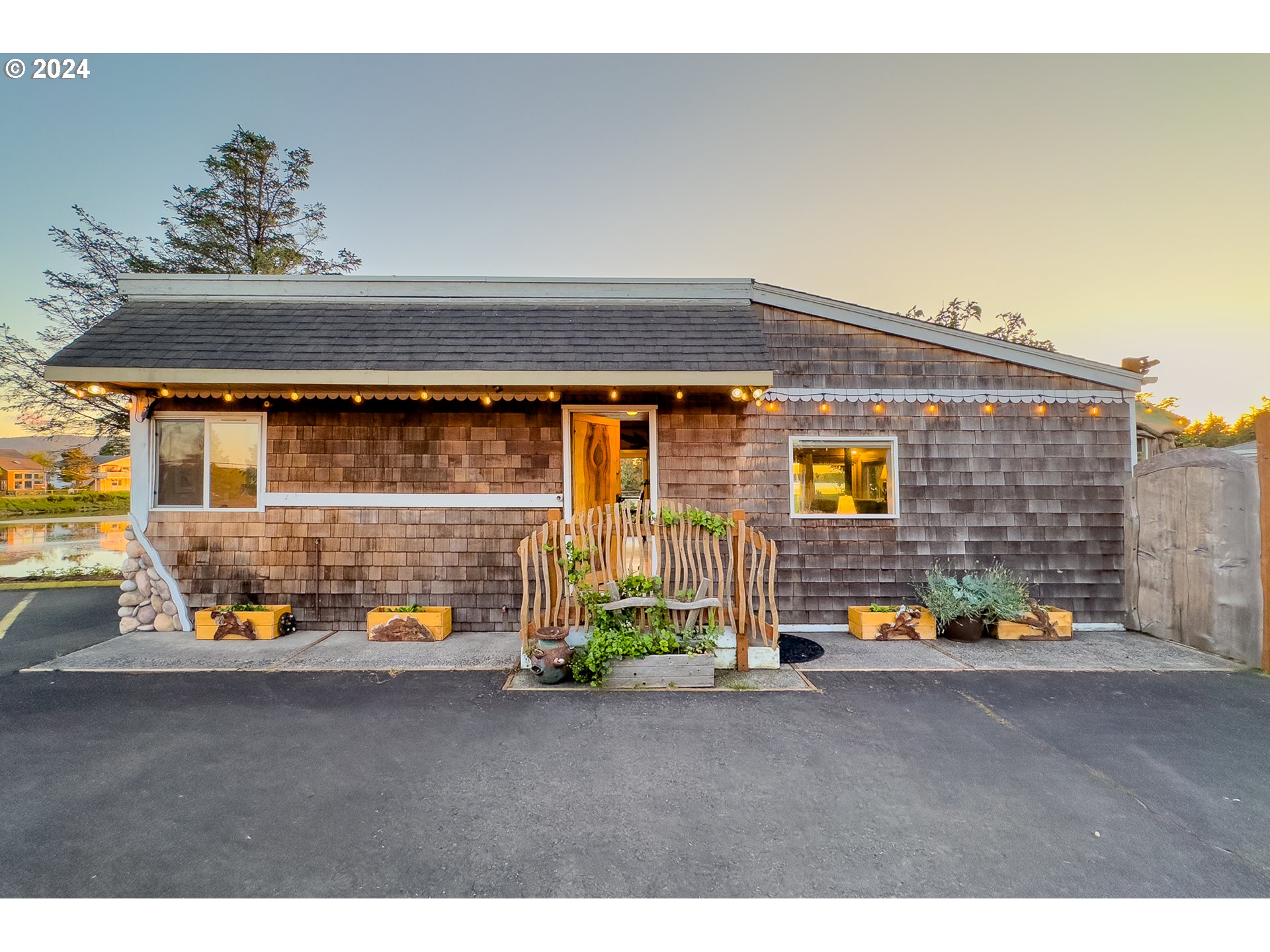 a view of outdoor space and front view of a house