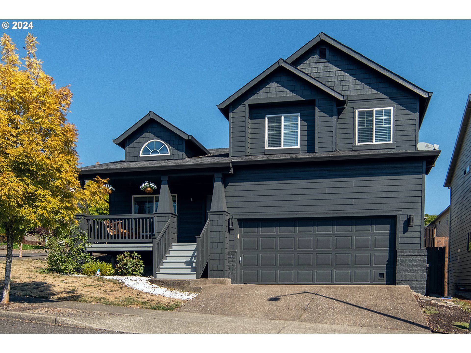 a view of a house with a garage