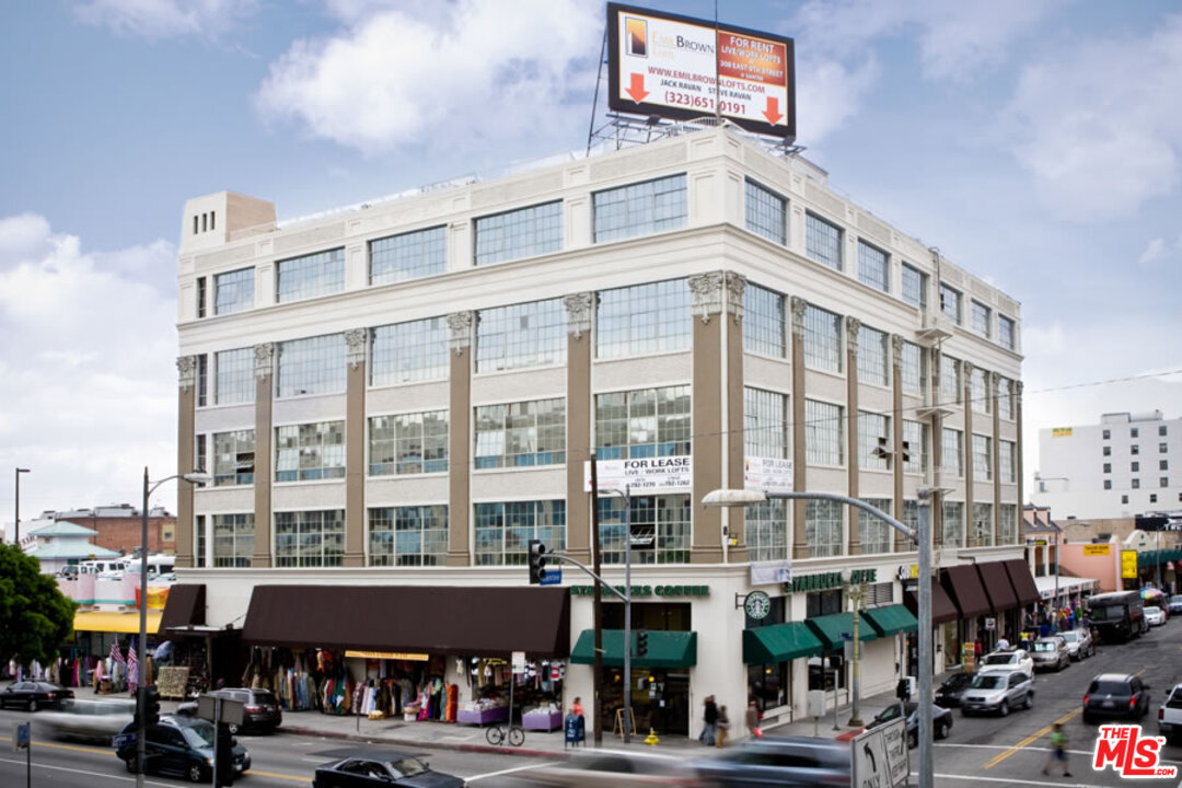 a front view of a building with street view