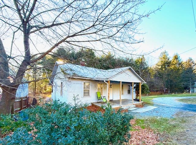 View of front of property with covered porch