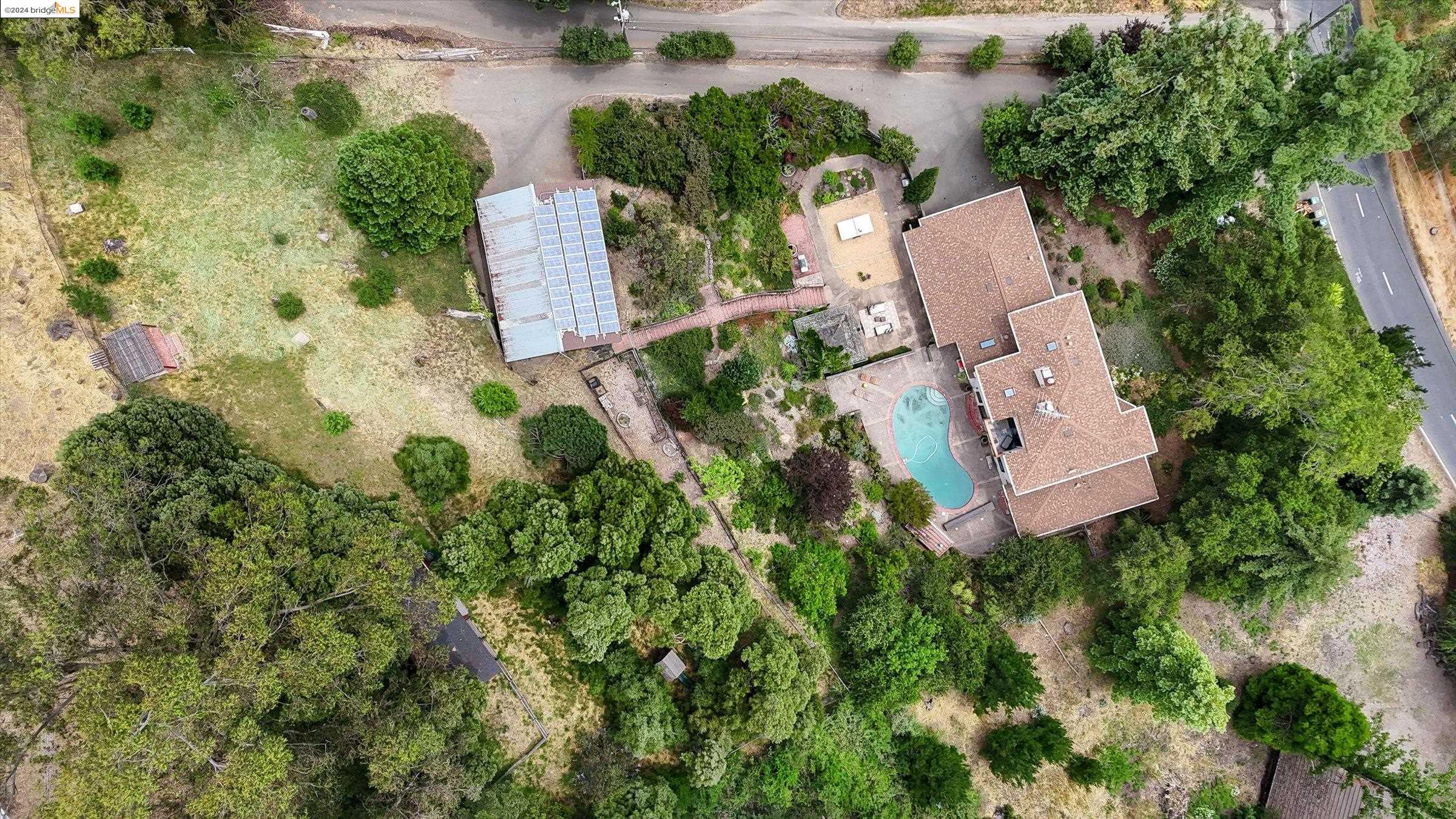 an aerial view of backyard with outdoor space