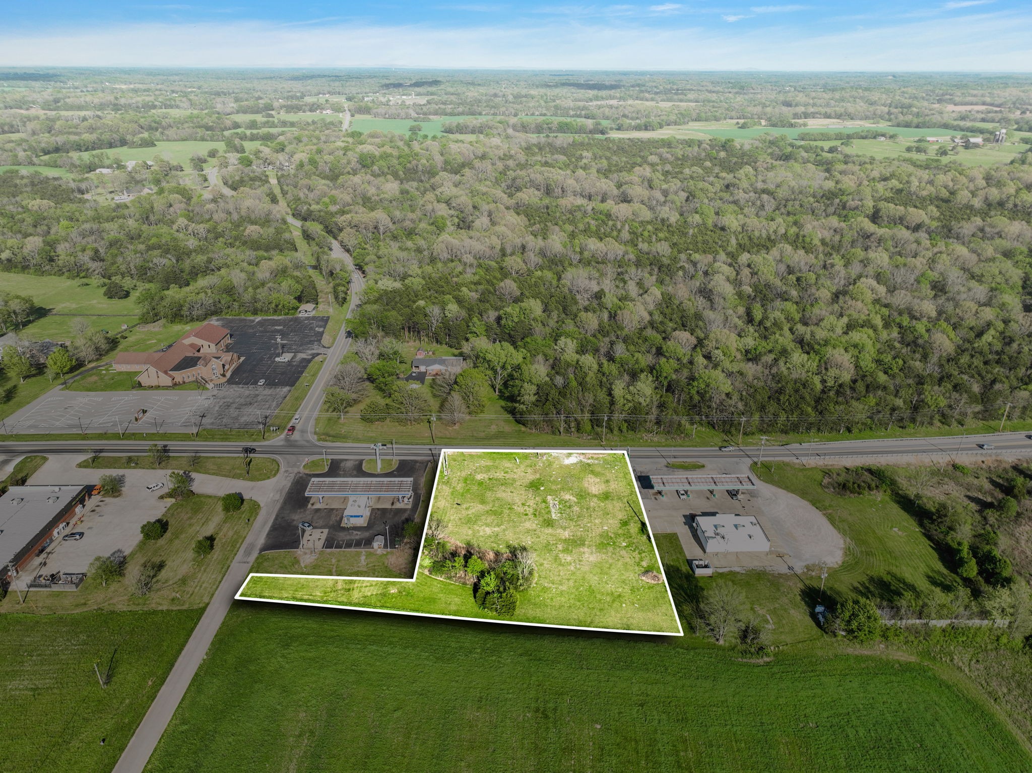 an aerial view of multiple houses with outdoor space