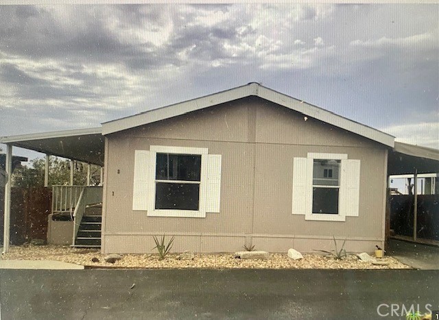 a house with river in front of it