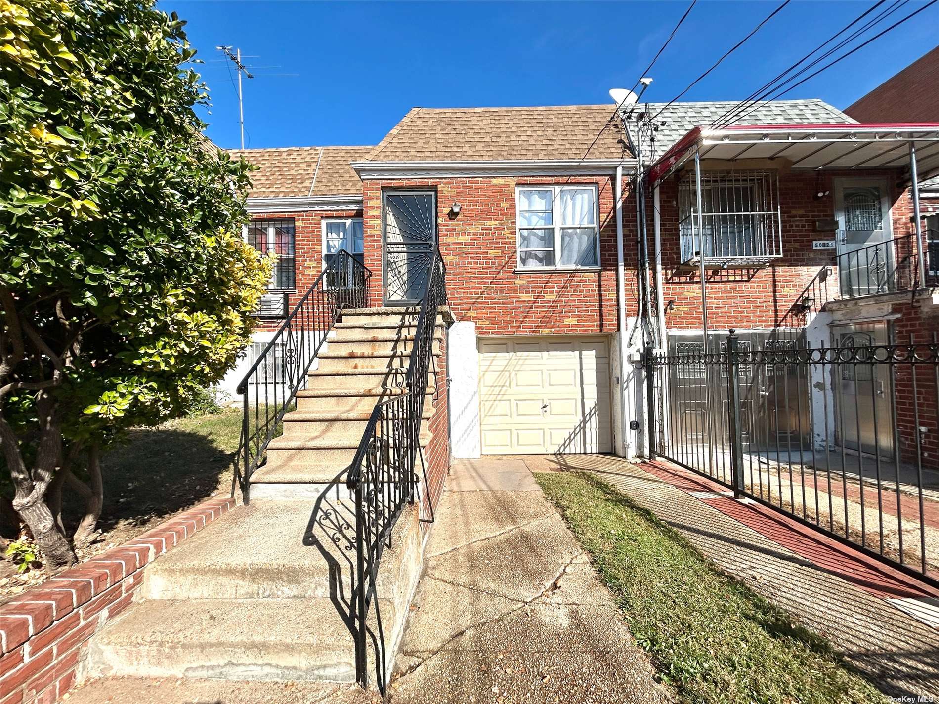 a front view of a house with a porch