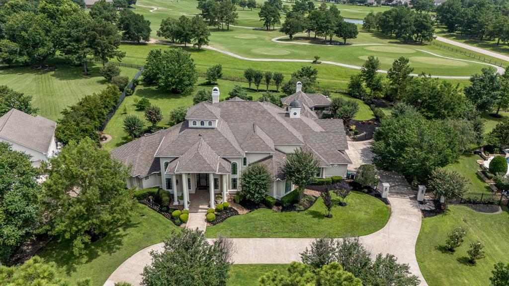 Gleannloch Farms luxury estate located the golf course and 1.3+ acres with a circular drive and gated parking area.