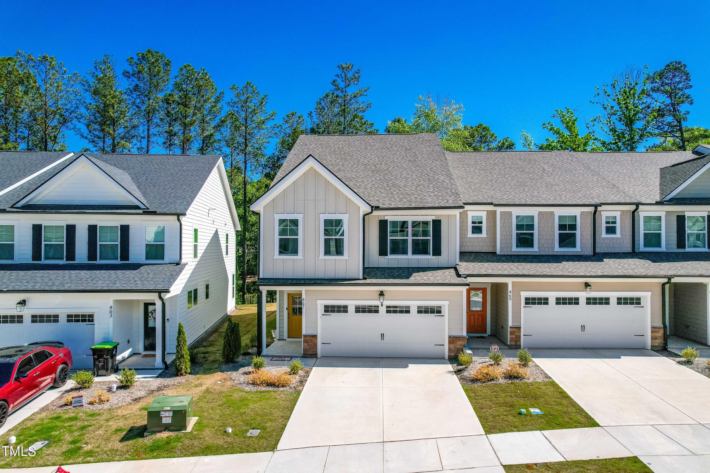 a aerial view of a house with yard and sitting area