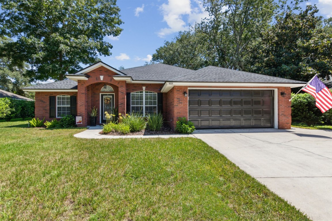 front view of a house with a yard